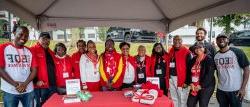 Group of alumni at Black Alumni Advisory Council tent